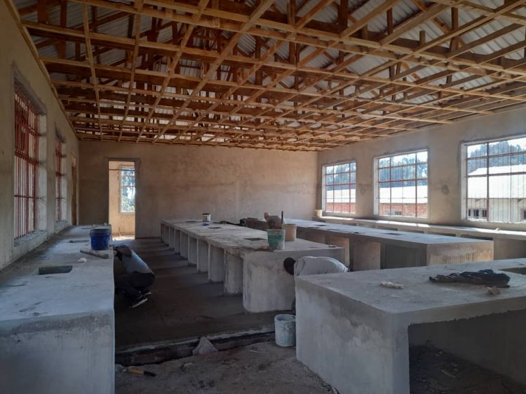 September 22, 2021: Concrete applied to lab stations and floor. Ready for plumbing. electrical and tile