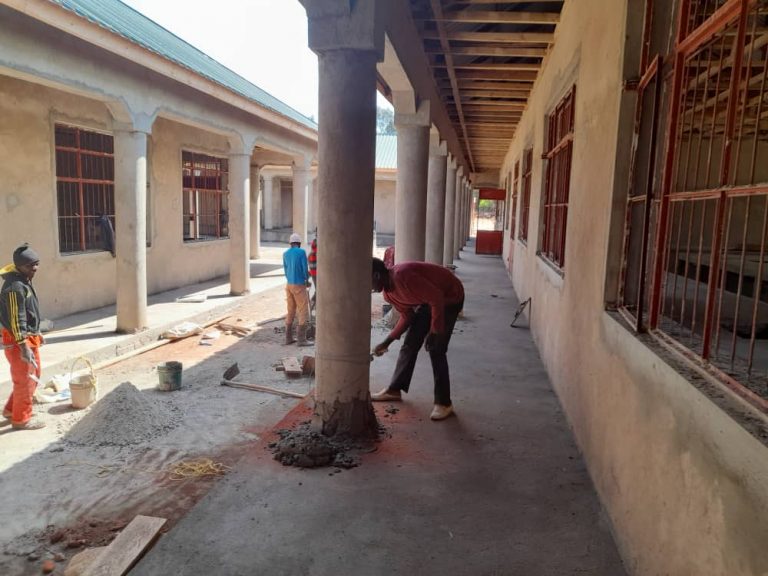 October 11, 2021: Brick walkways covered in concrete.